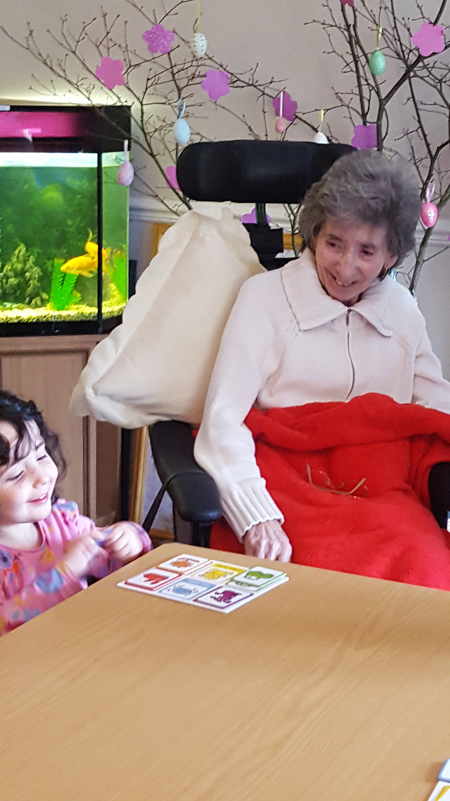 Nursery school makes new friends at care home